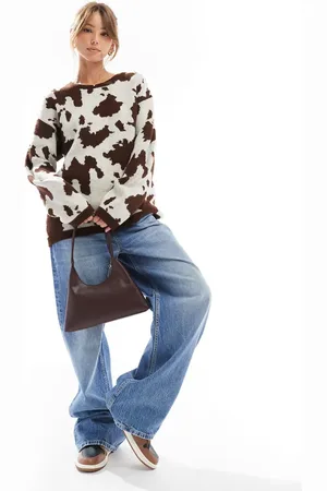 ASOS Fluffy knitted jumper in cow print