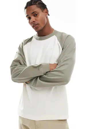 Hollister Icon logo heavyweight raglan long sleeve baseball t-shirt in beige/green