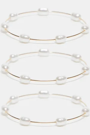 ASOS ASOS DESIGN Curve pack of 3 bangles with faux pearl detail in tone
