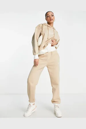 adidas Mountain Explorer contrast cuffed joggers in beige