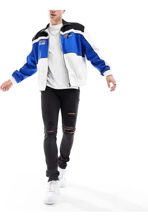 ASOS Skinny jeans in with knee rips and zip detail