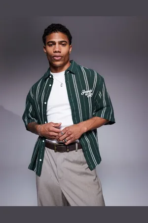ASOS Boxy oversized shirt in white and stripe with chest embroidery