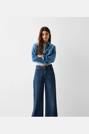 Bershka Petite high waisted wide leg jeans in dark