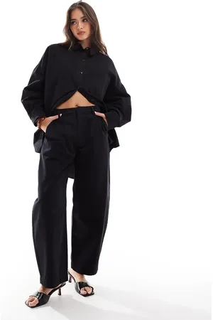 ASOS Premium arch leg trousers in washed
