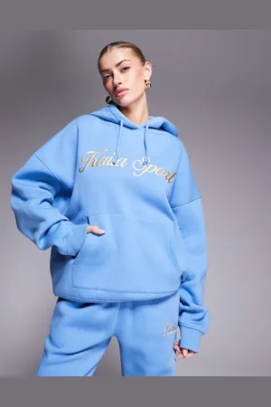 Kaiia Sport embroidered script logo hoodie co-ord in blue and yellow