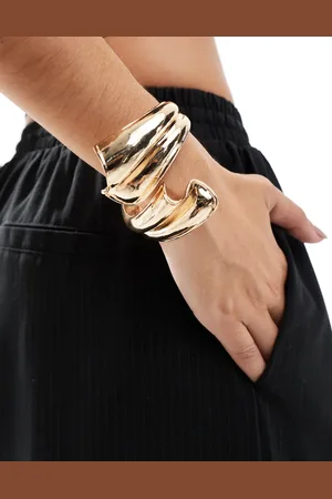 ASOS Cuff bracelet with wrap around abstract detail in tone