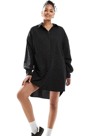 ASOS ASOS DESIGN Tall oversized shirt dress with dropped pockets in black pinstripe