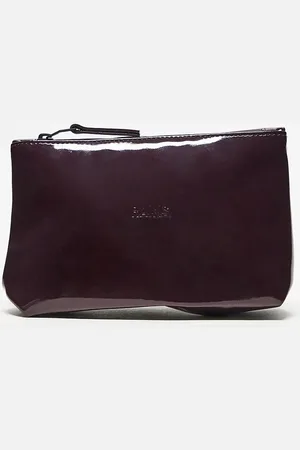 Rains Waterproof cosmetic bag in burgundy shine exclusive to asos