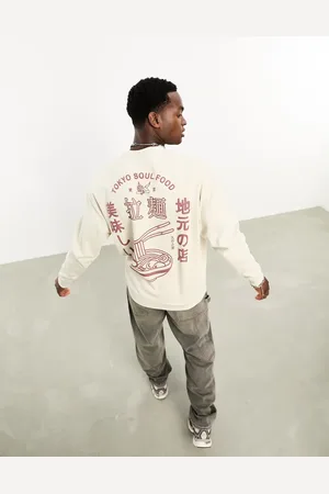 ASOS Oversized sweatshirt in beige with cartoon back puff print