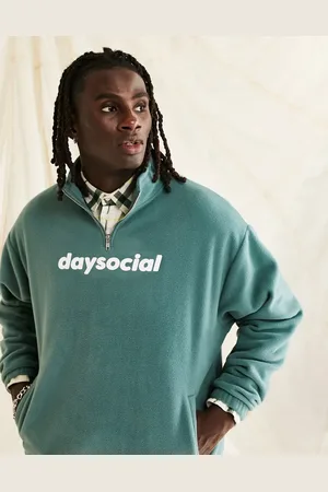 ASOS ASOS Daysocial oversized quarter zip sweatshirt in polar fleece in logo print in teal