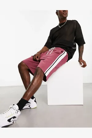 ASOS Oversized jersey shorts with side tipping in burgundy