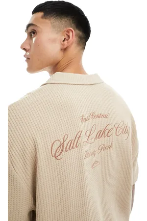 ASOS Oversized polo in waffle texture with back embroidery