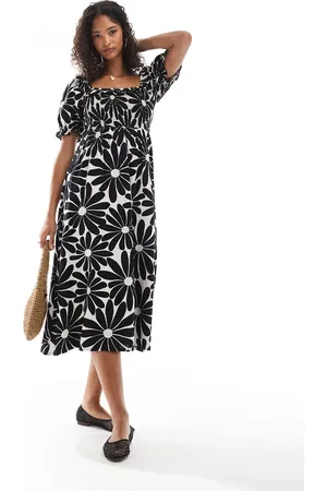 New Look Puff sleeve milkmaid dress in black floral print