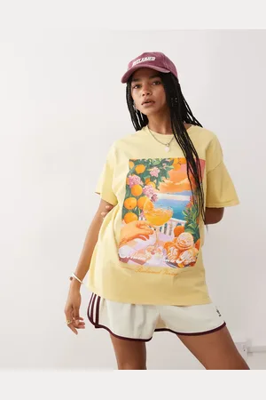 Reclaimed Oversized cotton t-shirt with holiday print in washed