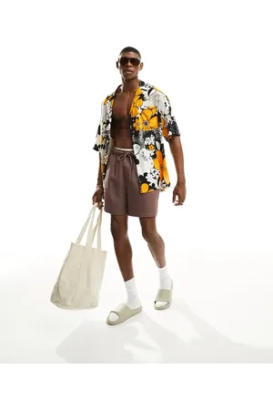 ASOS Oversized revere longline bowling shirt in 70s floral