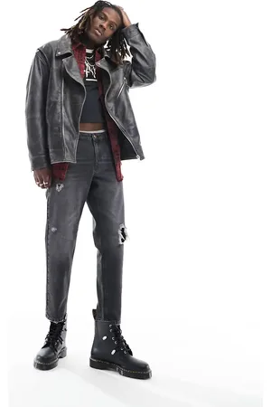 ASOS Tapered fit jeans with rips in washed