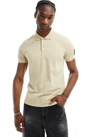 Calvin Klein Badge polo shirt in beige