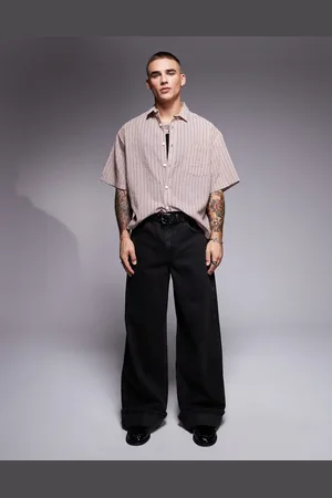 ASOS Super baggy jeans with turn up hem in washed black