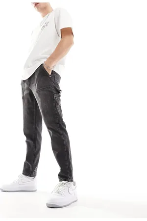 ASOS Tapered fit jeans with carpenter detail in washed