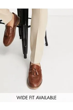 ASOS Tassel loafers in tan leather with natural sole