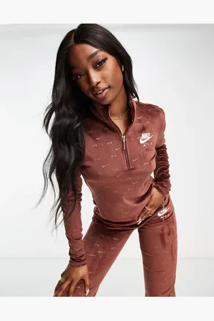 Nike Air long sleeve velour top in burgundy with all over swoosh