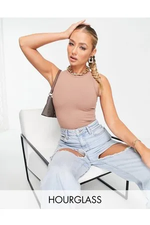 https://images.fashiola.in/product-list/300x450/asos/95830857/high-neck-ribbed-bodysuit-in.webp