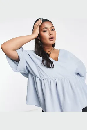 ASOS Curve wrap top with angel sleeve & peplum hem in light