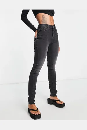 River Island High rise skinny jean with split zip hem in washed
