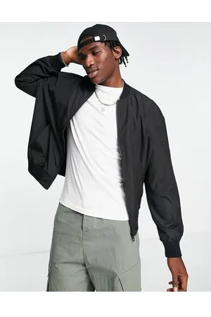 ASOS DESIGN oversized varsity cotton bomber jacket in green with embroidery  badging