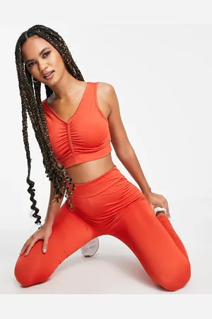 Threadbare Fitness ruched front gym crop top in cinnamon