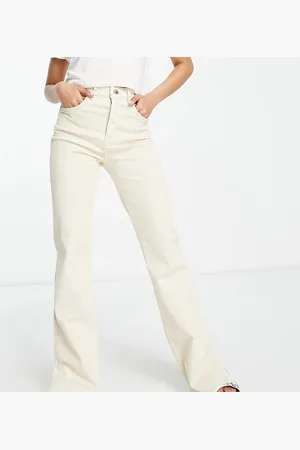 Stradivarius Petite slim flare jean with split detail in ecru