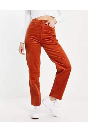 Monki Slim leg corduroy trousers in rust