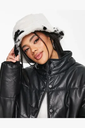 Jayley Faux fur bucket hat in cow print