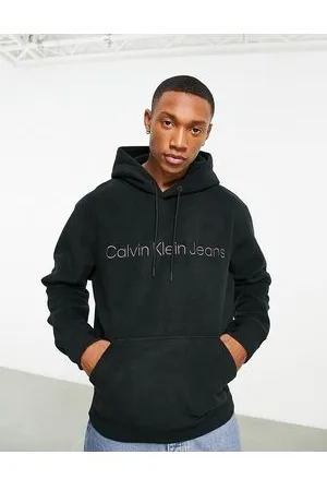 Calvin Klein text reverse chest logo T-shirt in black, ASOS