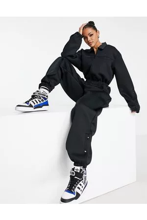 adidas Mountain Explorer funnel neck jumpsuit in