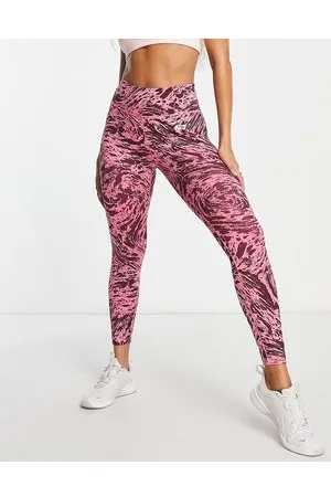Nike Air Running Dri-FIT mid rise legging in pink | ASOS