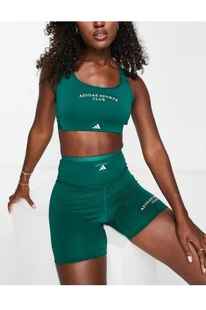https://images.fashiola.in/product-list/300x450/asos/99751600/adidas-training-sports-club-graphic-mid-support-sports-bra-in.webp