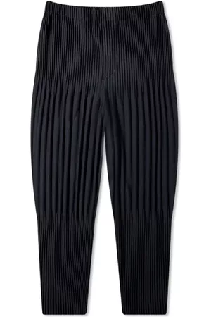 Mens Homme Plissé Issey Miyake black Pleated Tapered Trousers | Harrods #  {CountryCode}