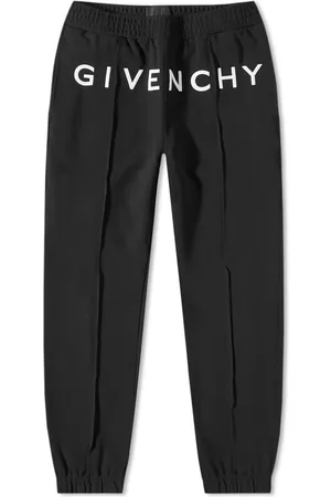 GIVENCHY + Disney Oswald Tapered Embroidered Cotton-Jersey Sweatpants for  Men