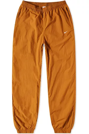 Nike - Solo Swish Tapered Logo-Embroidered Shell Track Pants