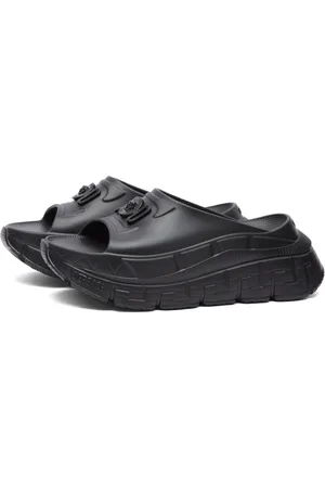 40 Black Slide Heel Sandals Royalty-Free Images, Stock Photos & Pictures |  Shutterstock