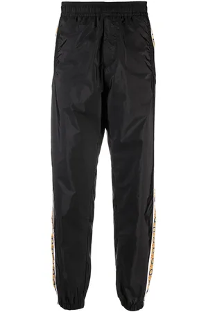 VERSACE Graphic-stripe taffeta track pants