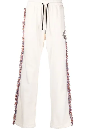 MARCELO BURLON Fringe-detailing jersey track-pant