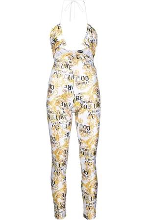 VERSACE Women Jumpsuits - Logo-print halterneck jumpsuit