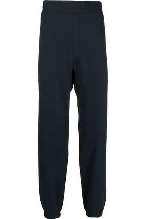 SUICOKE Logo-print cotton track pants