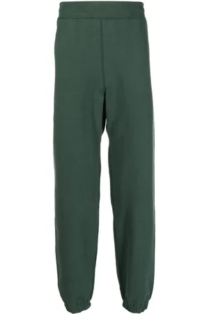 SUICOKE Logo-print cotton track pants