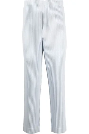 HOMME PLISSÉ ISSEY MIYAKE: Off-White Kersey Pleats Trousers