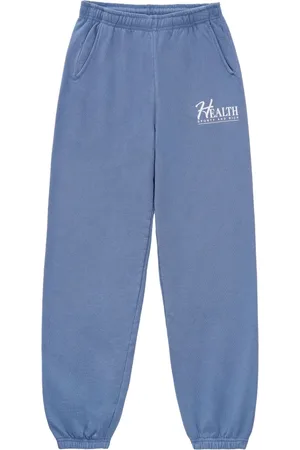 Sporty & Rich Slogan-print cotton track pants