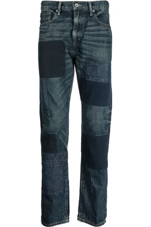 NEIGHBORHOOD Patch-detail washed-denim jeans