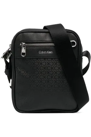 Calvin Klein monogram-print Zipped Messenger Bag - Farfetch